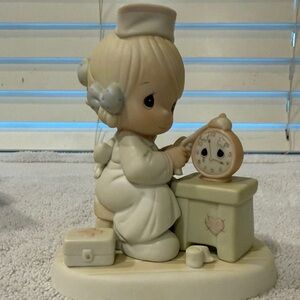 Adorable Nurse Figurine with Clock